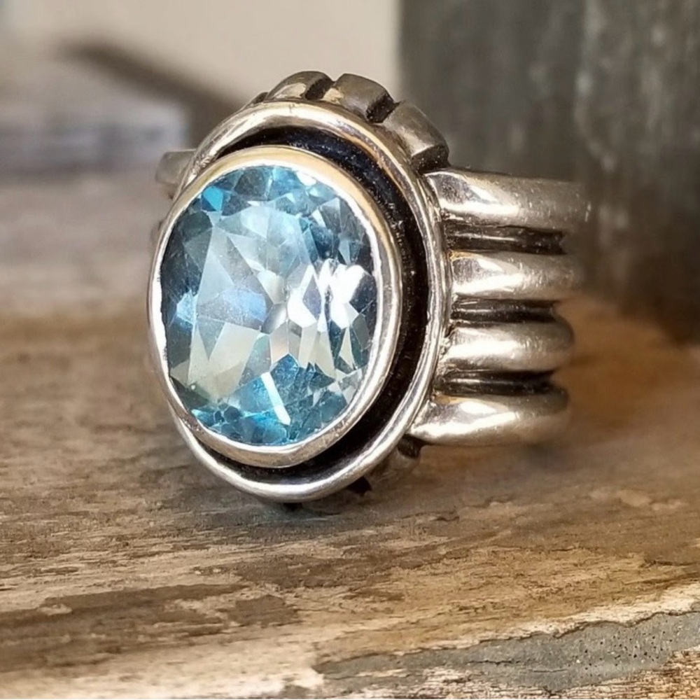 Silpada retired sterling silver and blue topaz ring.